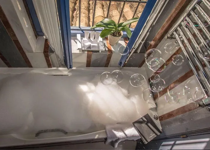 Отель Casas De La Juderia De